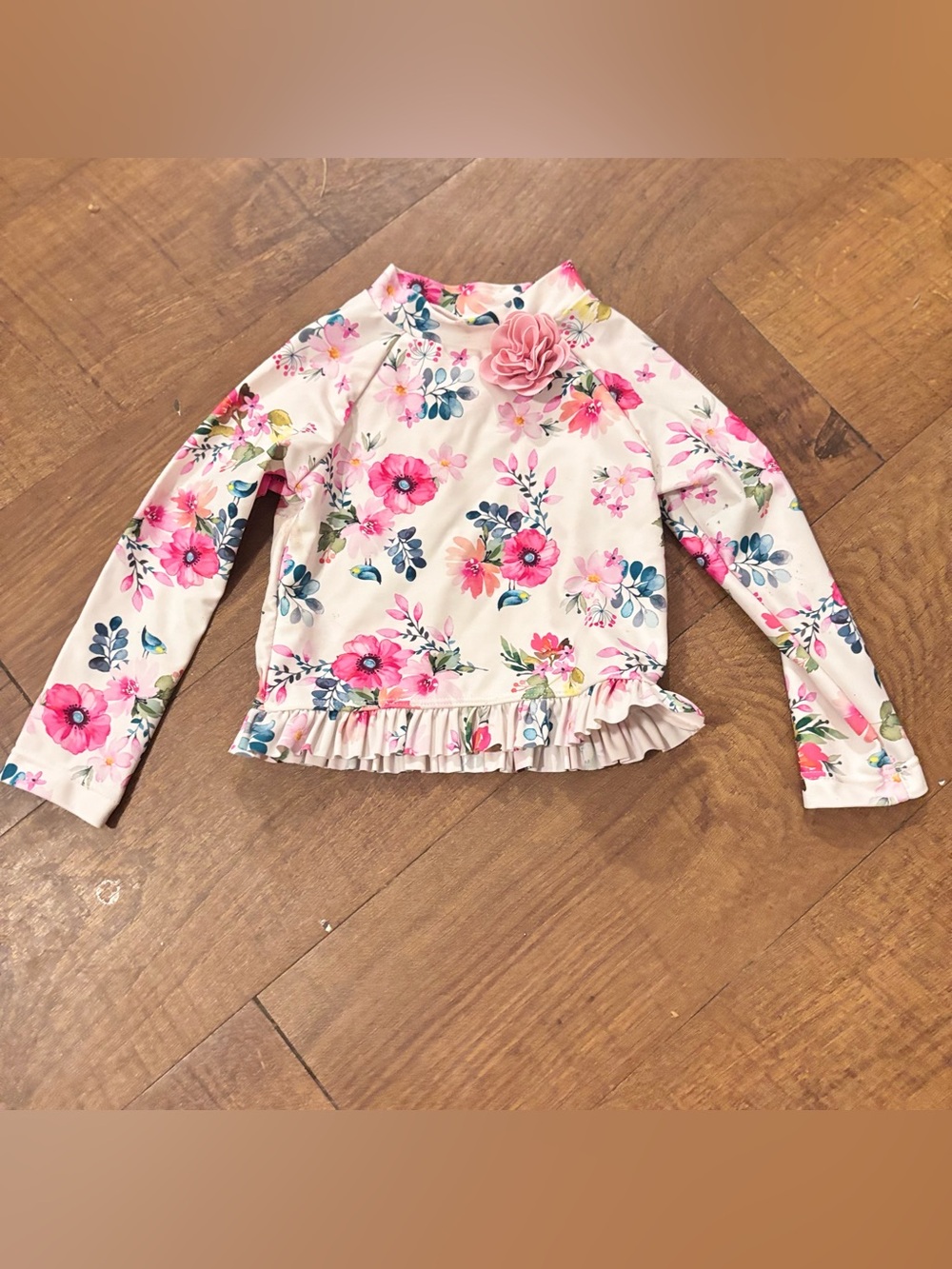 Little Me White Floral Ruffle Hem rash guard Top with Pink Accents